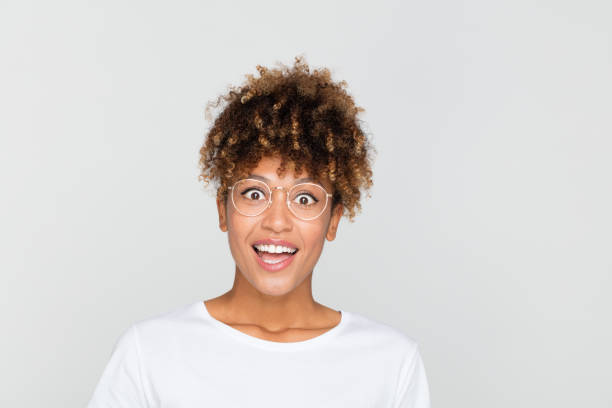 istock Surprised african woman in eyeglasses 1056238552