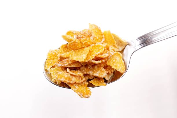 istock Breakfast cereal - sugar-coated flakes of corn 1056239982