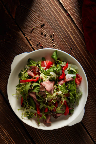 istock Warm salad with veal. 1056244078