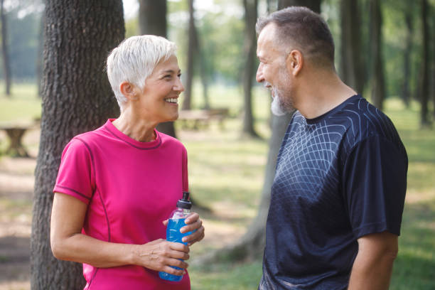 istock Senior couple exercising outdoors 1056245572