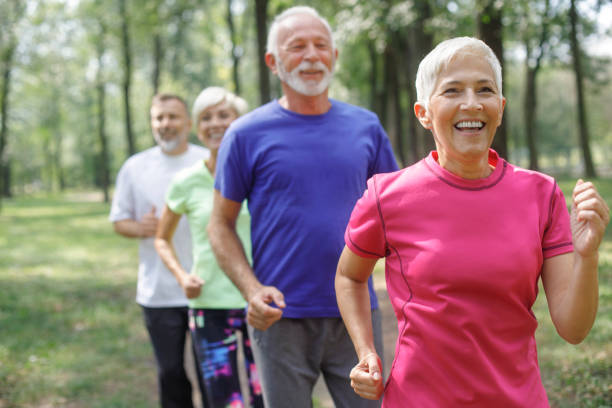 istock Senior people jogging outdoors 1056245578