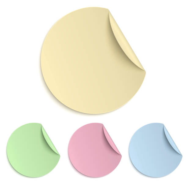 istock Set of round paper sticker isolated on white background. Light from upper right. 1056245858