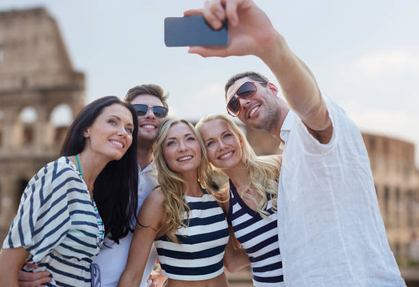 istock friends taking selfie with smartphone 1056251476