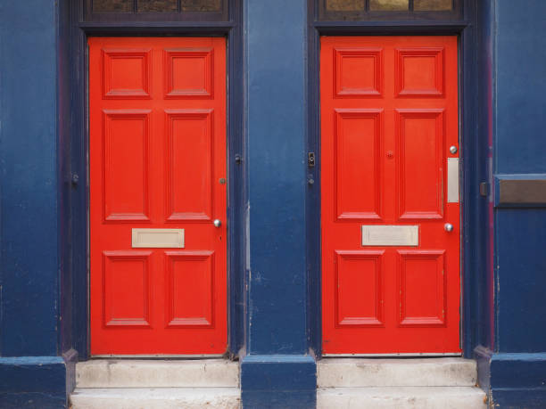 istock red traditional british doors 1056253620