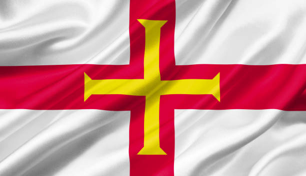istock Guernsey flag waving with the wind, 3D illustration. 1056254868