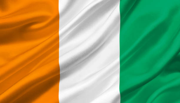 istock Ivory Coast flag waving with the wind, 3D illustration. 1056257896