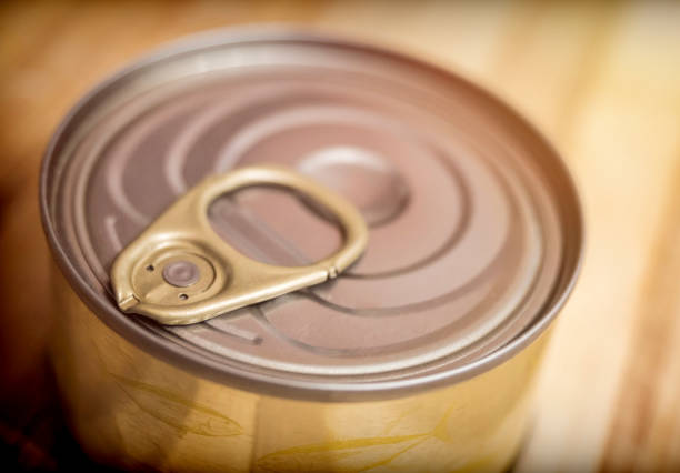 istock Tin on a wooden board in a kitchen 1056262764