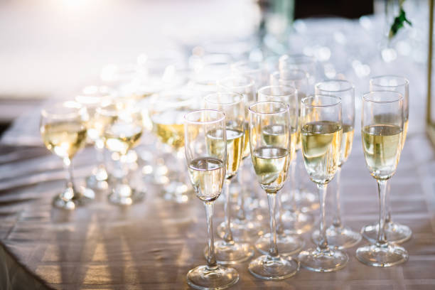 istock Festive table setting with champagne. champagne glasses close up. 1056263282