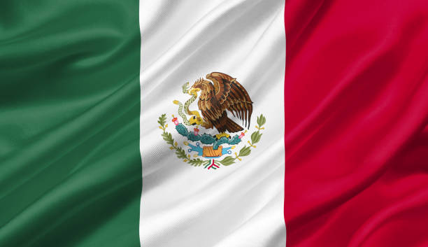 istock Mexico flag waving with the wind, 3D illustration. 1056263696