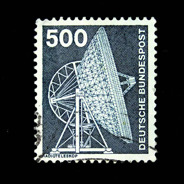 A stamp printed in West Germany shows image of a radio telescope