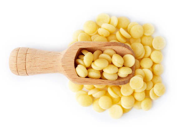 istock Organic cacao butter buttons (wafers) 1056281080
