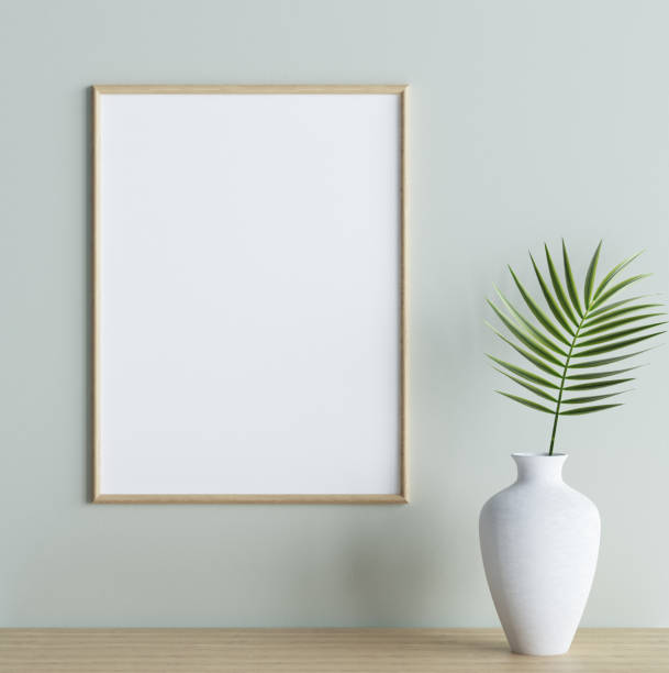 makieta ramki plakatu z rośliną w wazonie na półce w wewnętrznym tle - blackboard blank green frame zdjęcia i obrazy z banku zdjęć