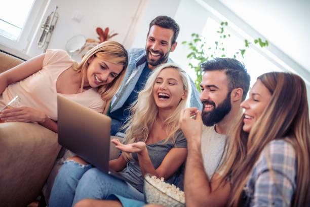 istock Cheerful group of friends having fun at home 1056284324