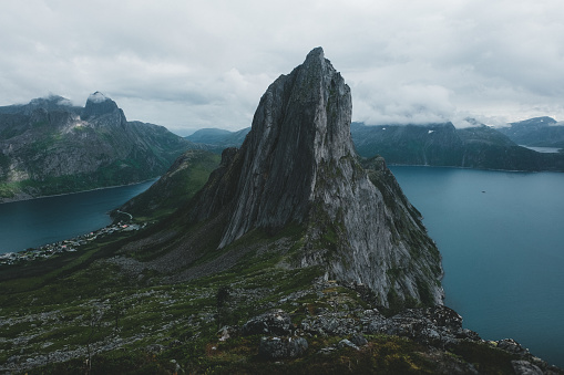 View of huge cliffs, mountain and northern sea on Senja island