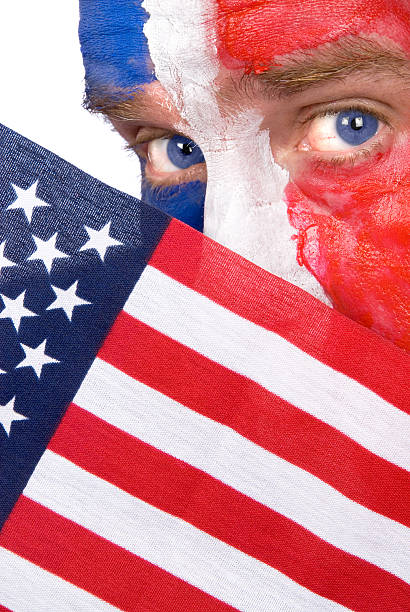 istock Patriotic man peering over an American flag 105628745