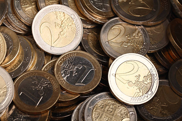 istock Background of one and two euro coins 105628794
