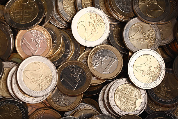 istock Background of one and two euro coins 105628800