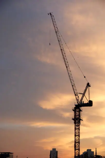 Tower crane on the sunset