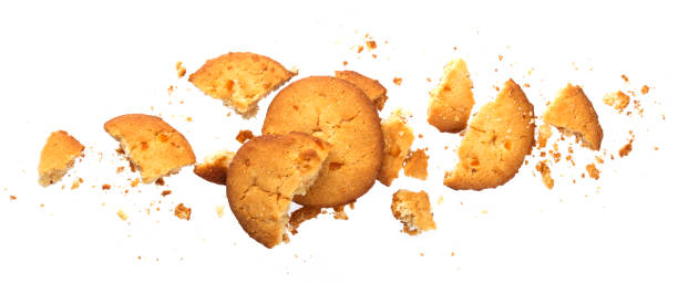istock Broken oatmeal cookies isolated on white background 1056292404