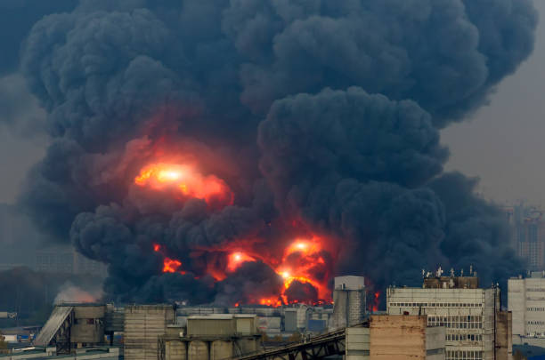 istock Powerful explosion with bright flashes and black smoke in the city. 1056302080