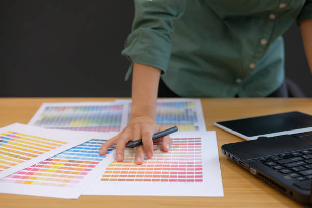 istock graphic interior designer choosing color from swatch sample catalogue palette guide 1056306360