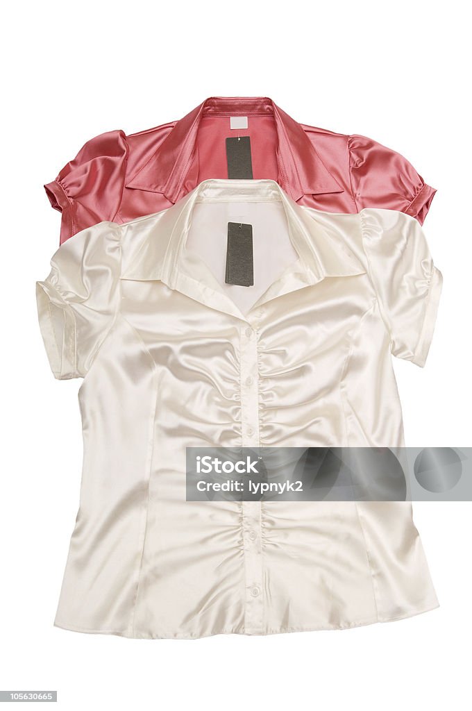 Red and white shirts . Two fine  shimmering blouses  isolated on a white background. Blouse Stock Photo