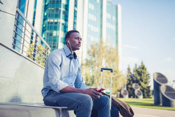 istock Handsome businessman on a business trip. 1056306668