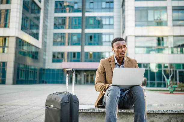 istock Handsome businessman on a business trip. 1056306730