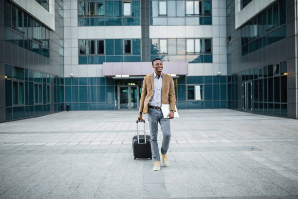 istock Handsome businessman on a business trip. 1056306792