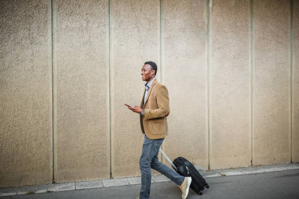 istock Handsome businessman on a business trip. 1056306908