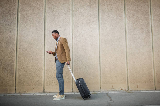 istock Handsome businessman on a business trip. 1056306916