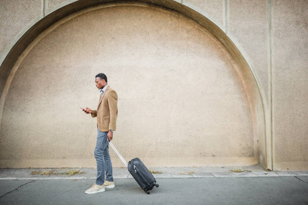 istock Handsome businessman on a business trip. 1056306982
