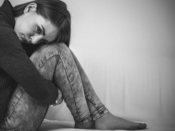 istock Unhappy and sad woman 1056308746