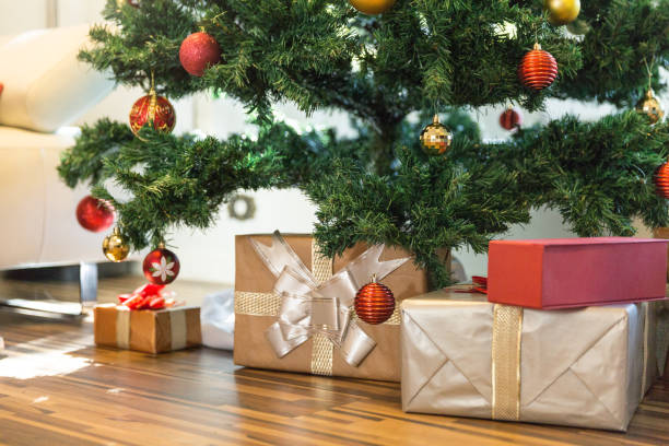 istock Christmas tree and presents at house 1056314306