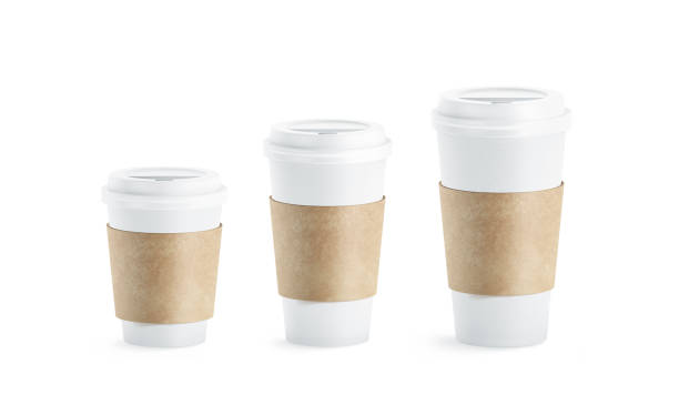 Blank white paper cup with craft sleeve holder mockup set Blank white paper cup with craft sleeve holder mockup set, isolated, 3d rendering. Empty disposable container with clutches for coffee or tea mock up. Clear drink pack with zarfs different size. sleeve stock pictures, royalty-free photos & images