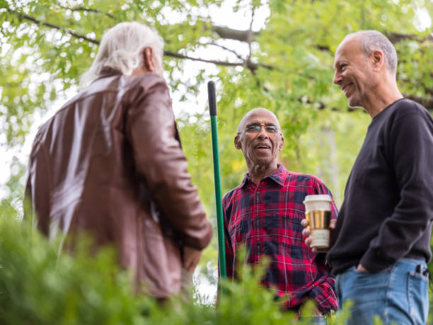 istock Senior neighbors friendly talk 1056316678