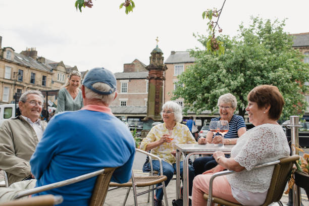 istock Seniors Drinking Rose at Cafe 1056319488
