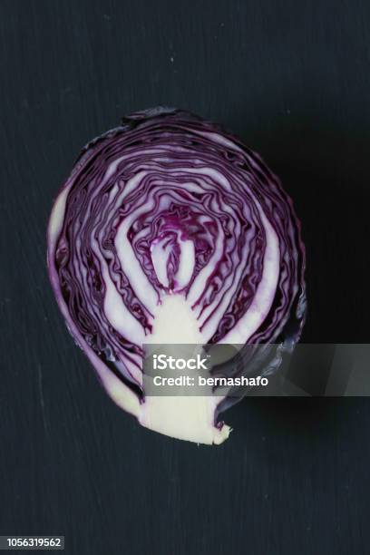 Red Cabbage On A Black Background Stock Photo - Download Image Now - Backgrounds, Cabbage, Crucifers