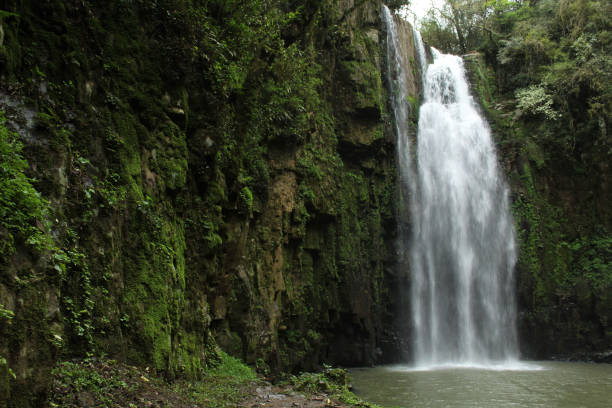istock Wild Waterfall In The Nature 1056322210
