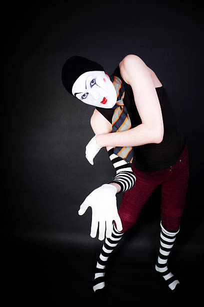 istock Funny mime in white gloves on black background 105632684