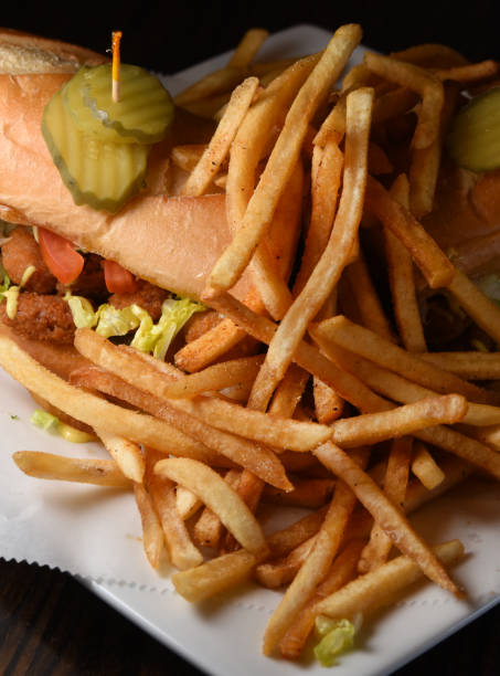 istock Fried Shrimp Po-boy Sandwich Slant 1056328148