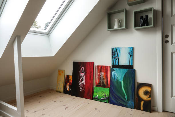 Home interior. Art collection in modern attic apartment.