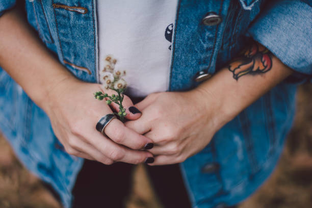 istock Close up of woman's hands with ring accessories 1056333792