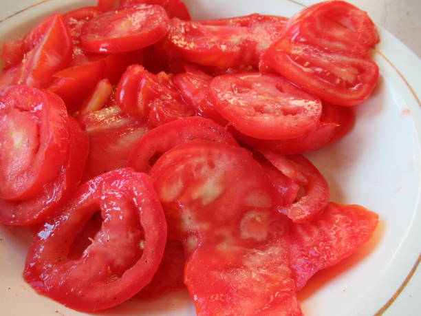 istock Slices of Fresh Tomatoes 1056334588
