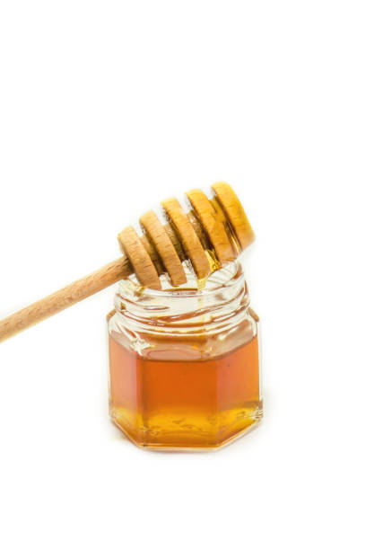 istock honey on a white background. selective focus. Food. 1056335698