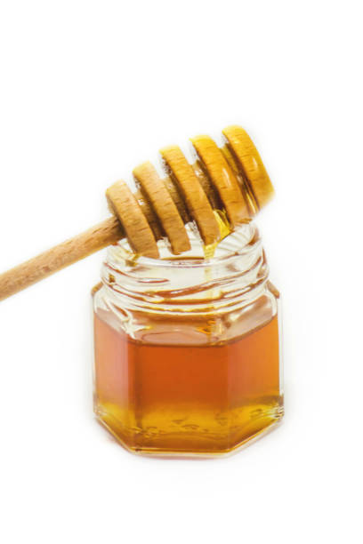 istock honey on a white background. selective focus. Food. 1056335714