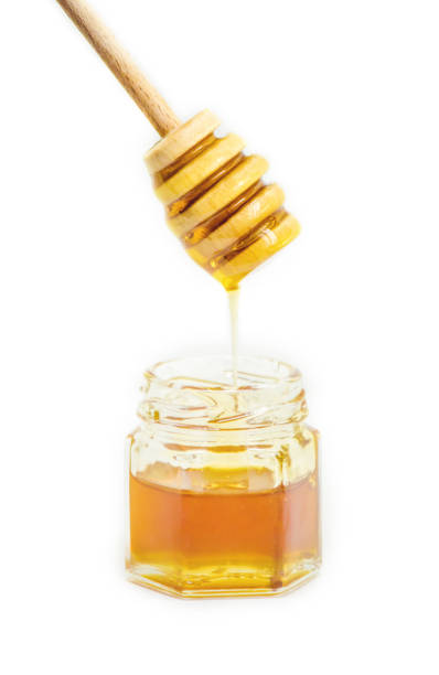 istock honey on a white background. selective focus. Food. 1056335726