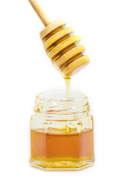 istock honey on a white background. selective focus. Food. 1056335730