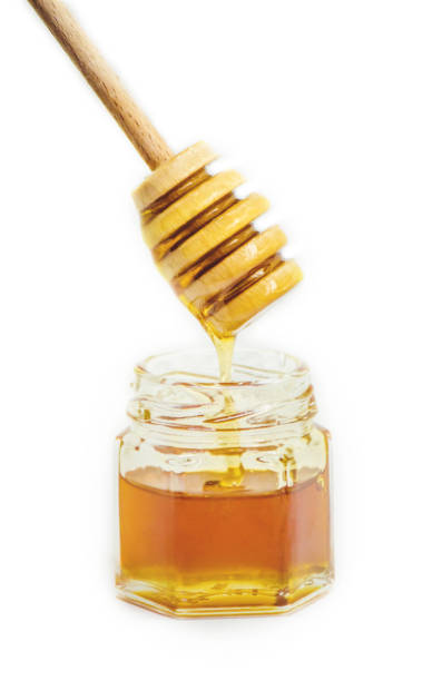 istock honey on a white background. selective focus. Food. 1056335734