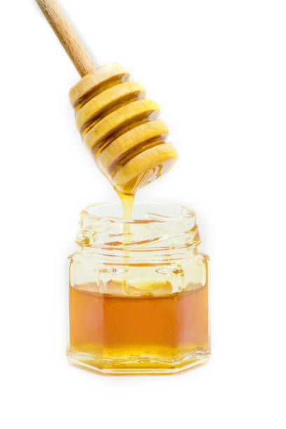 istock honey on a white background. selective focus. Food. 1056335738